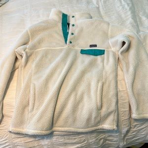 White Patagonia with blue detailing